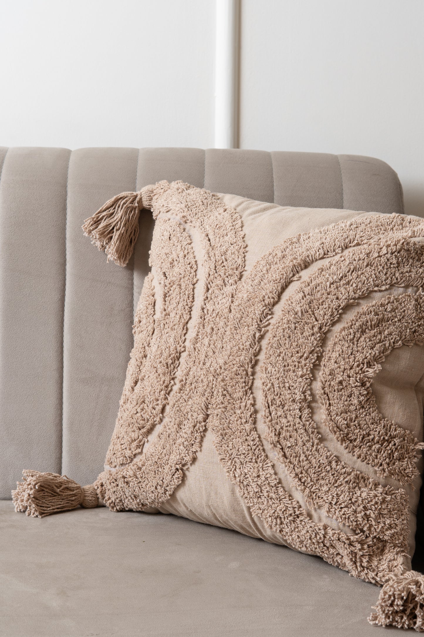 Boho tufted beige, peach cushion with tassels minimal